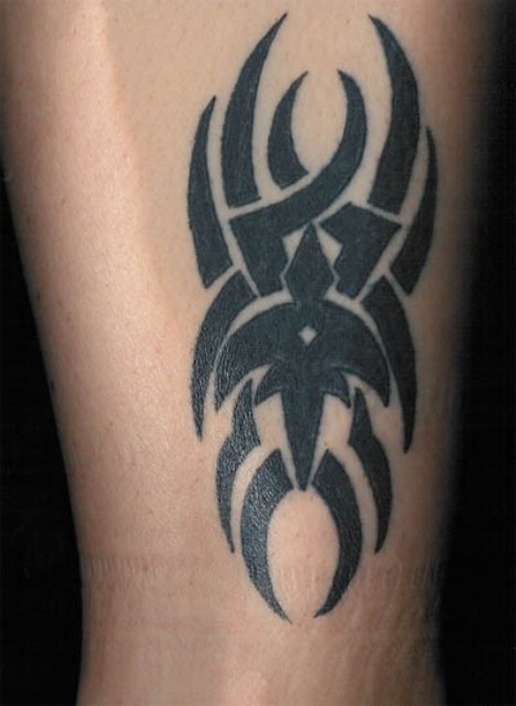 Rain's (from the Queensrÿche Message Board) Tri-Rÿche tattoo.