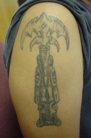 Tri-ryche totem tattoo.