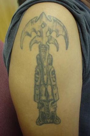 War Chief's (Queensrÿche Message Board) Tri-rÿche totem tattoo.